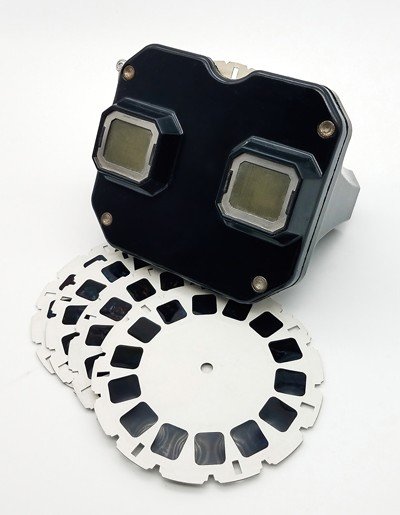 a vintage View-Master toy with films