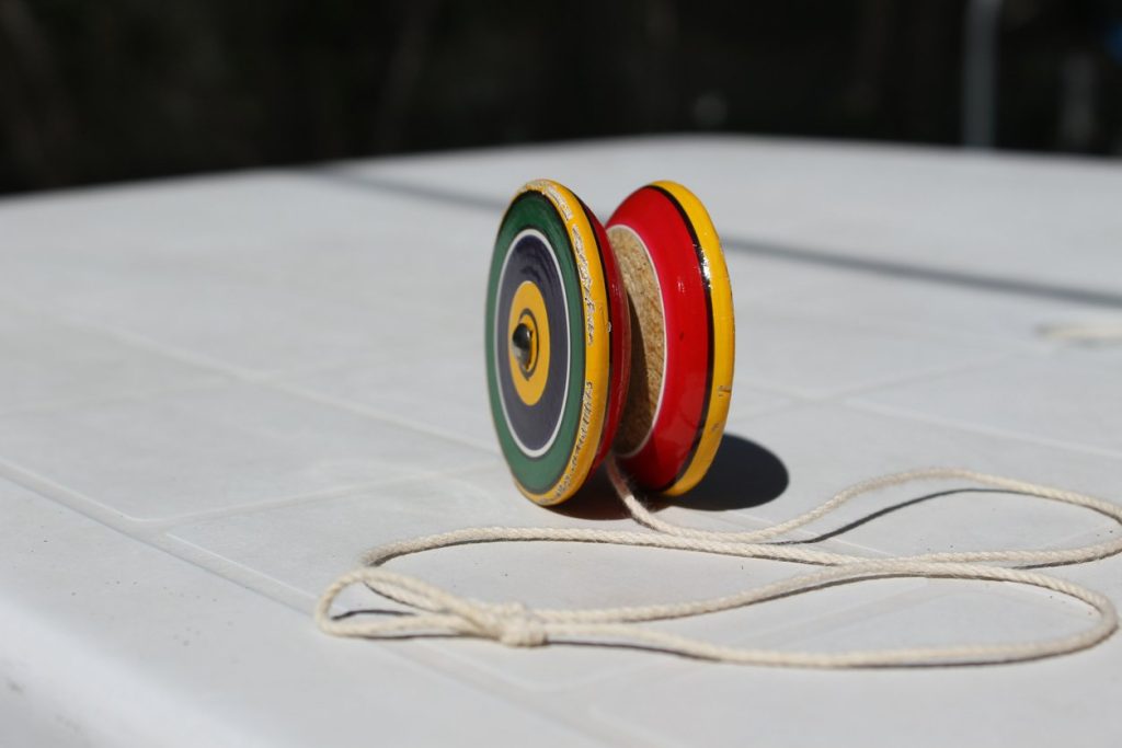 a wooden yo-yo toy