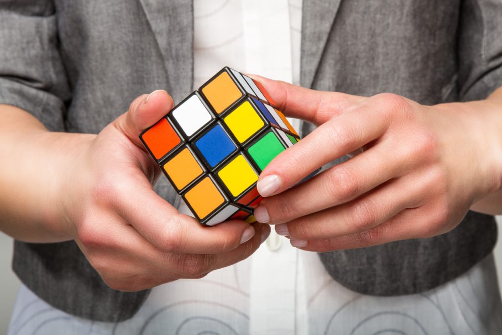 person holding a Rubik's cube